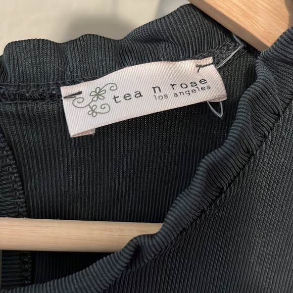 Quarter length black peplum - Picture 3 of 5